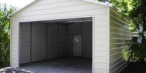 Boxed Eve Style Boxed Eve Garage with an Overhead door